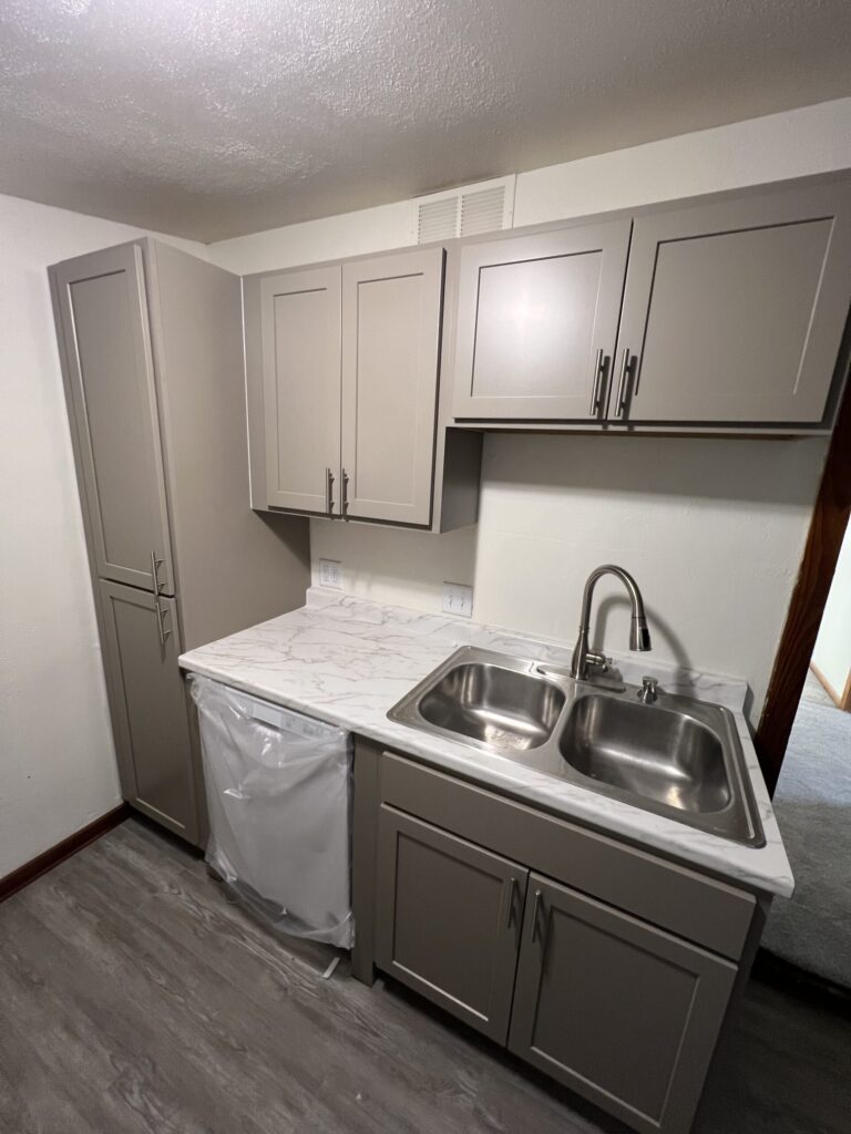 This image shows what the kitchen area looks like after remodeling has been done